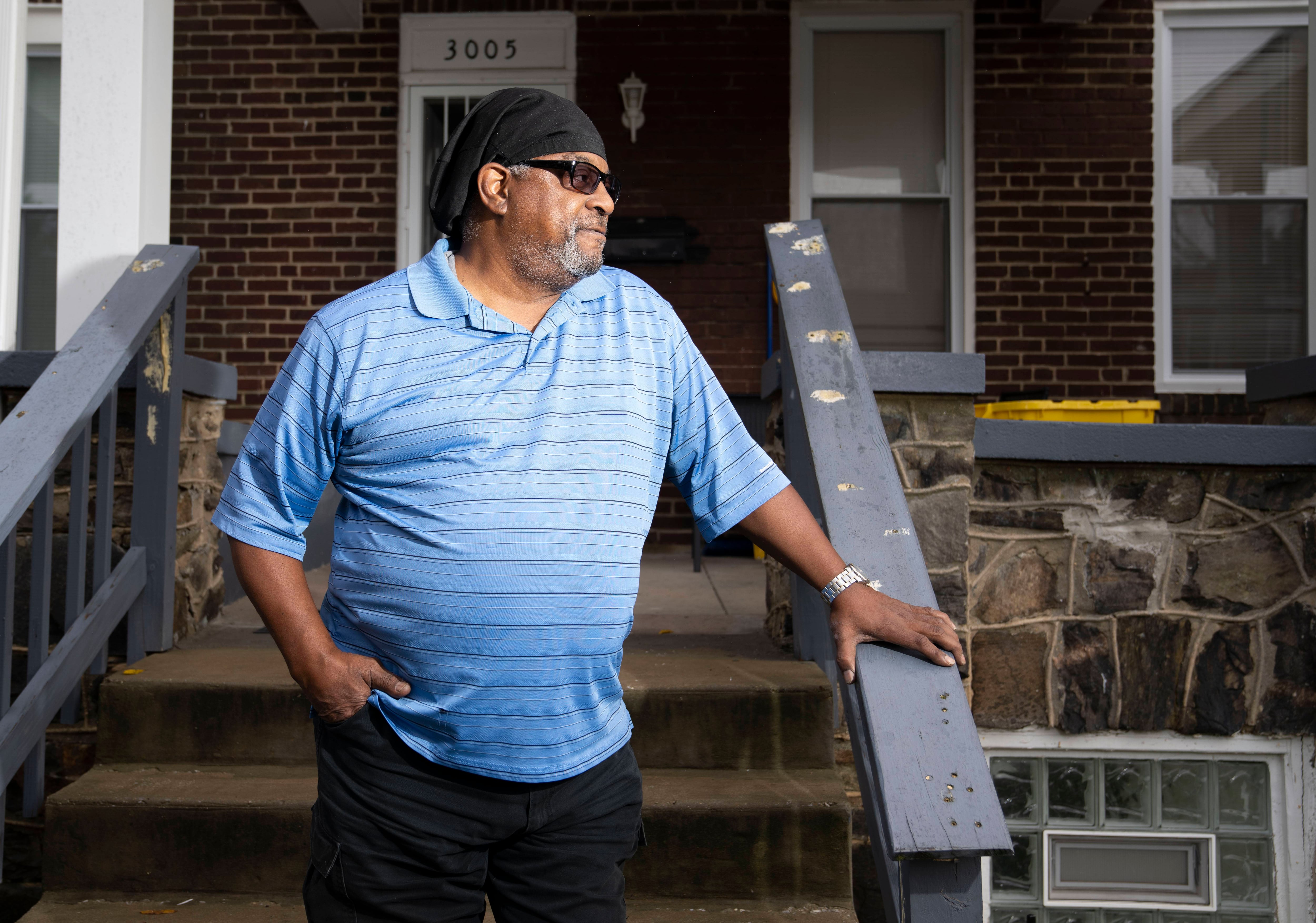 Brian Oliver poses for a portrait outside of his home in Baltimore, MD, Thursday, October 13, 2022.