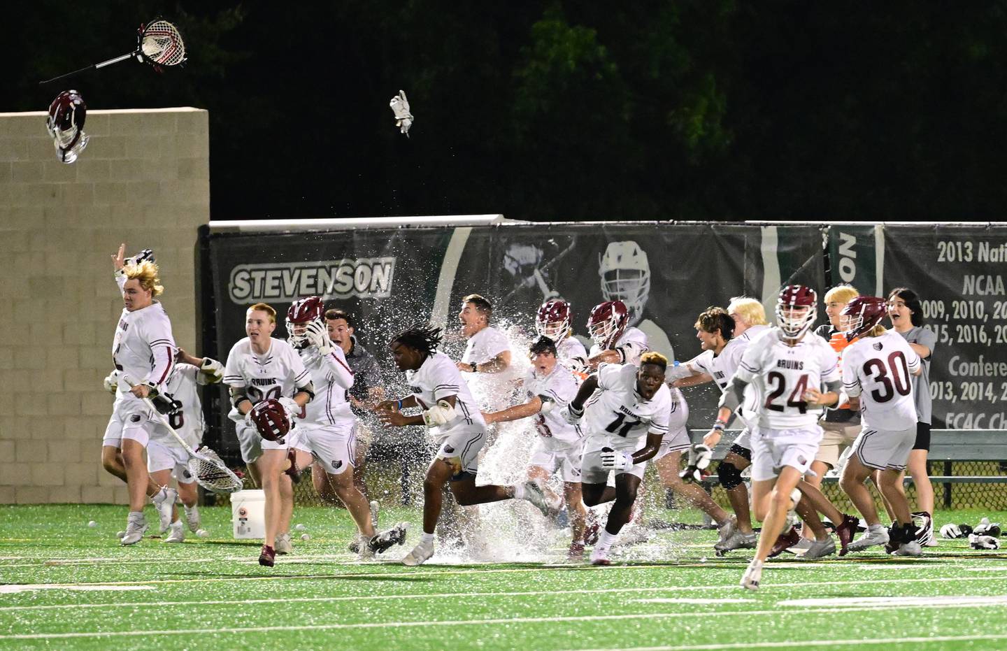 With ice and water showering down, the Broadneck bench races onto the field at the final horn to celebrate their team's 16-6 victory over Sherwood in the Class 4A boys lacrosse state championship game at Stevenson University.