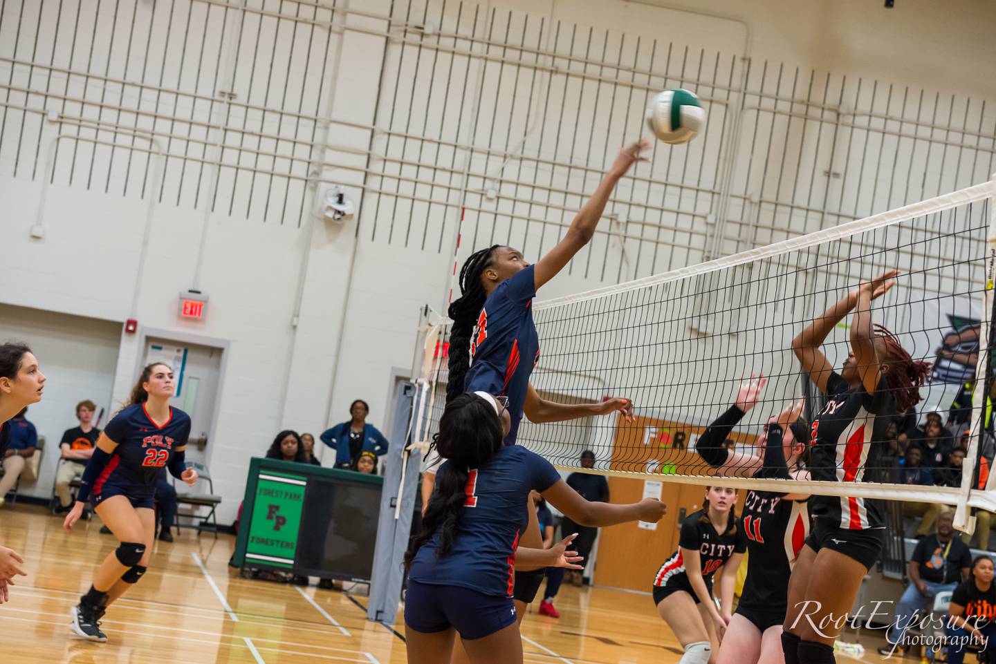 Poly's Kendyll Moore returns a shot during Tuesday's Baltimore City volleyball championship game at Forest Park. The Engineers will compete in the Class 3A North Region playoffs next week.