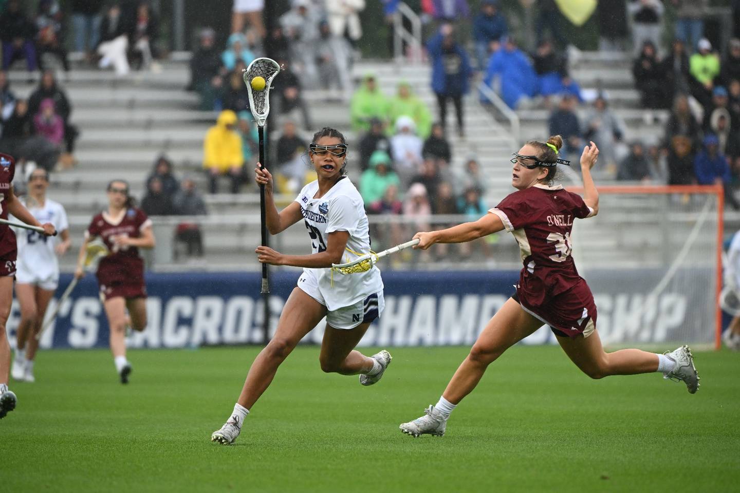 Sammy White, a Timonium native who played at Dulaney, maneuvers past a Boston College player in the Division I women's lacrosse national championship game in Philadelphia. White and Northwestern won, 18-6.