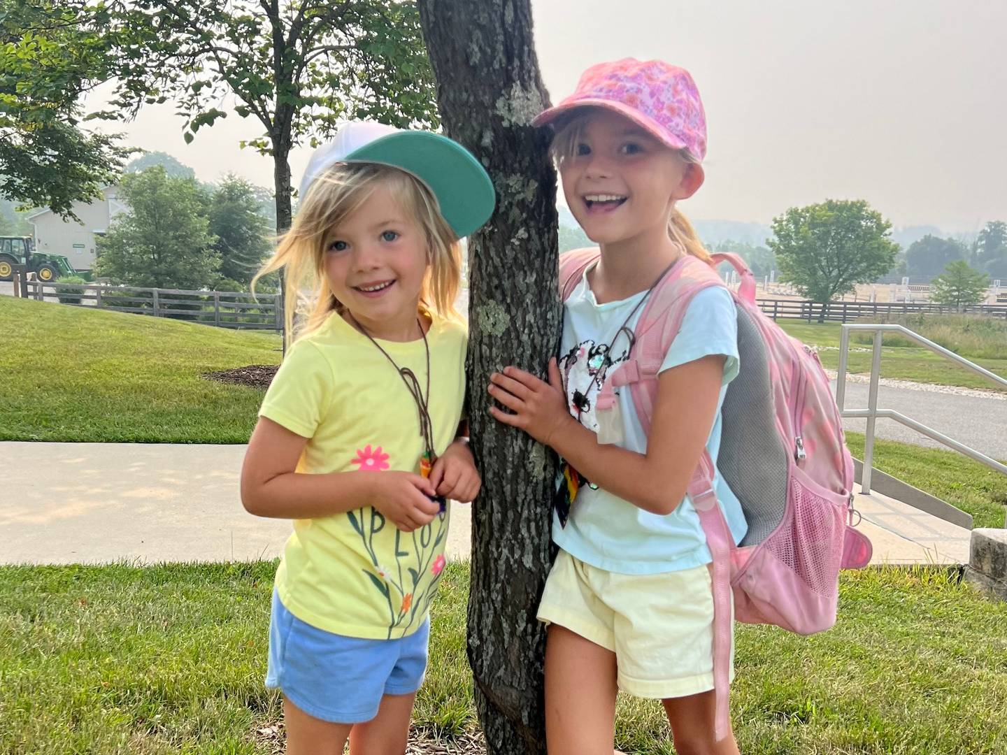 Lucia and Alma Korman heading to farm camp at the Baltimore County AG Center last year.