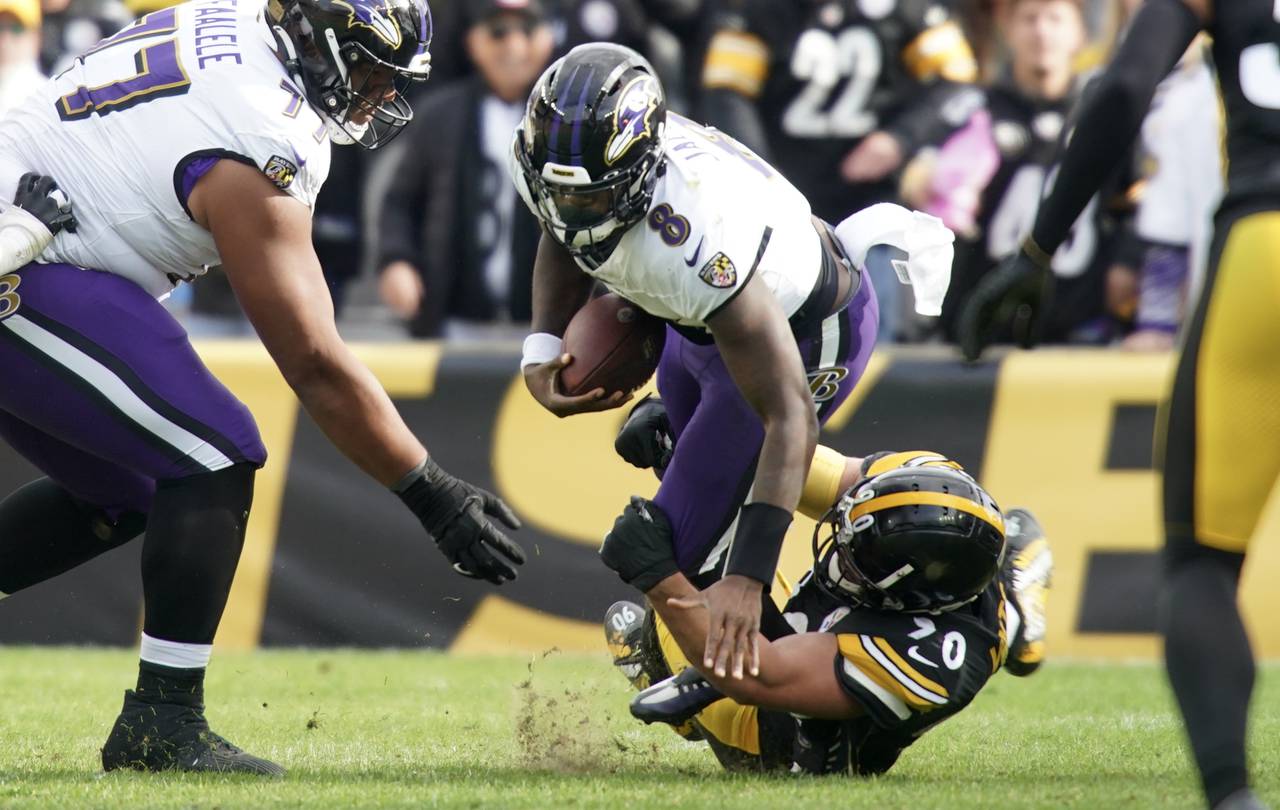 Steelers' #90m T.J. Watt sacked Ravens Lamar Jackson witn .15 second to play in thge game sealing a 17-10 Steeler victory Sunday Oct. 8th, 2023 at Arcisure Stadium in Pittsburgh, PA.
