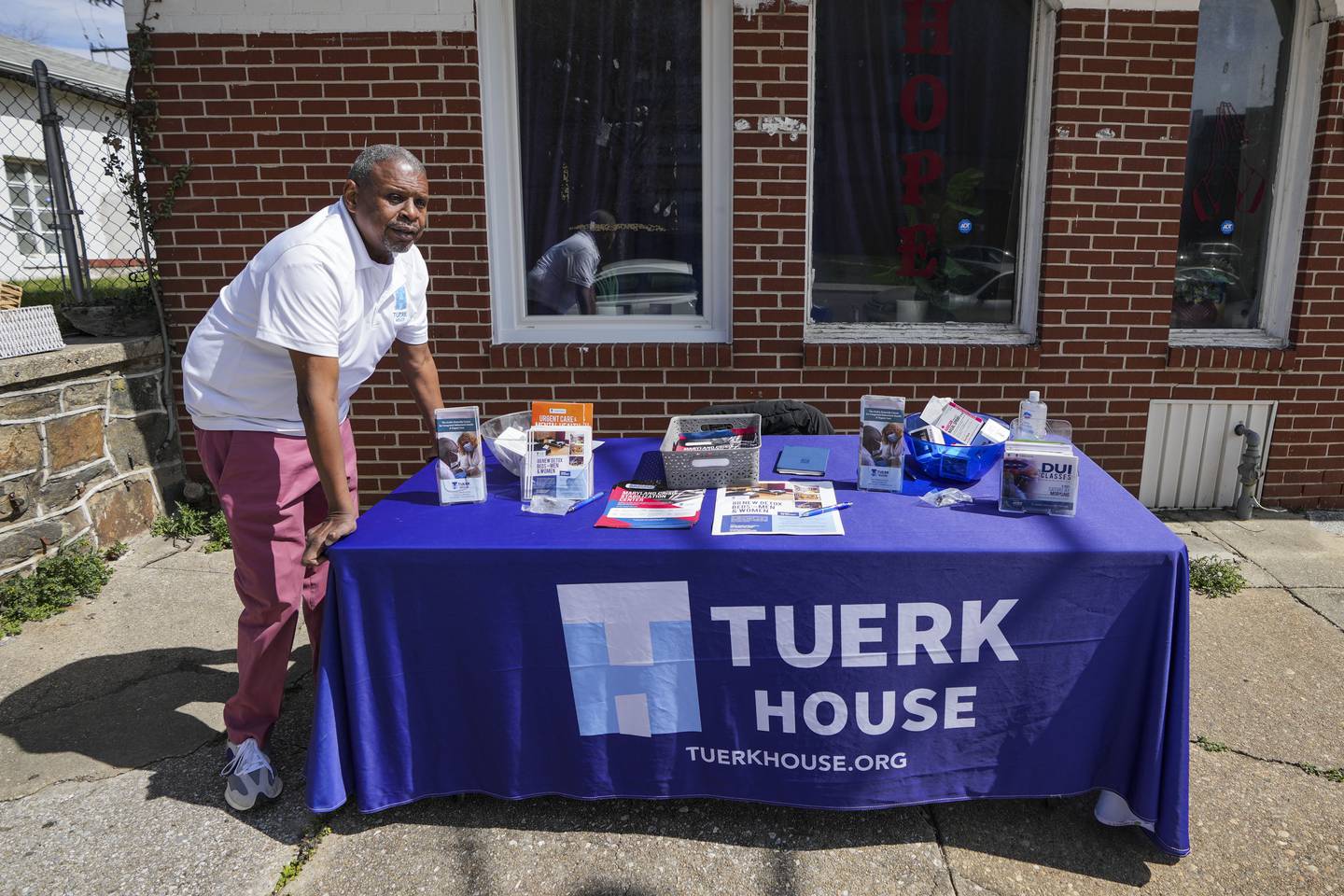 At Poplar Grove Street and West Lafayette Avenue, as the lone outreach specialist of Tuerk House, Vincent Timmons, provides information to help people battling addiction in Baltimore, MD., on March 21, 2023. He loves to help people and give them options to overcome their addictions or use other resources from the organization.