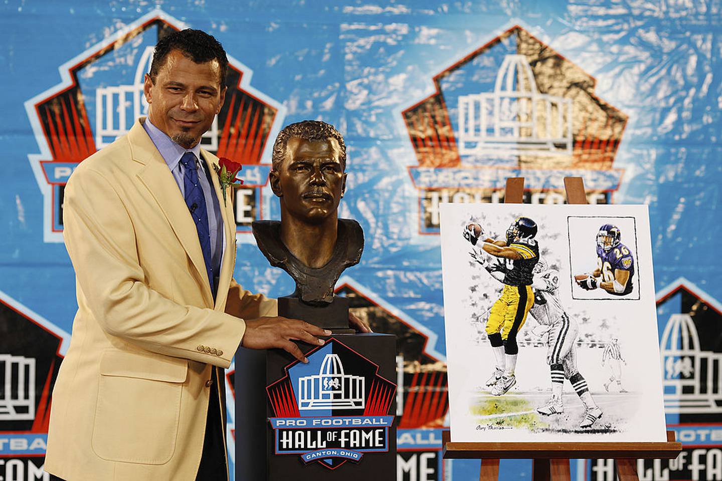 CANTON, OH - AUGUST 8: Rod Woodson poses with his bust at his induction into the Pro Football Hall of Fame during the 2009 enshrinement ceremony at Fawcett Stadium on August 8, 2009 in Canton, Ohio.