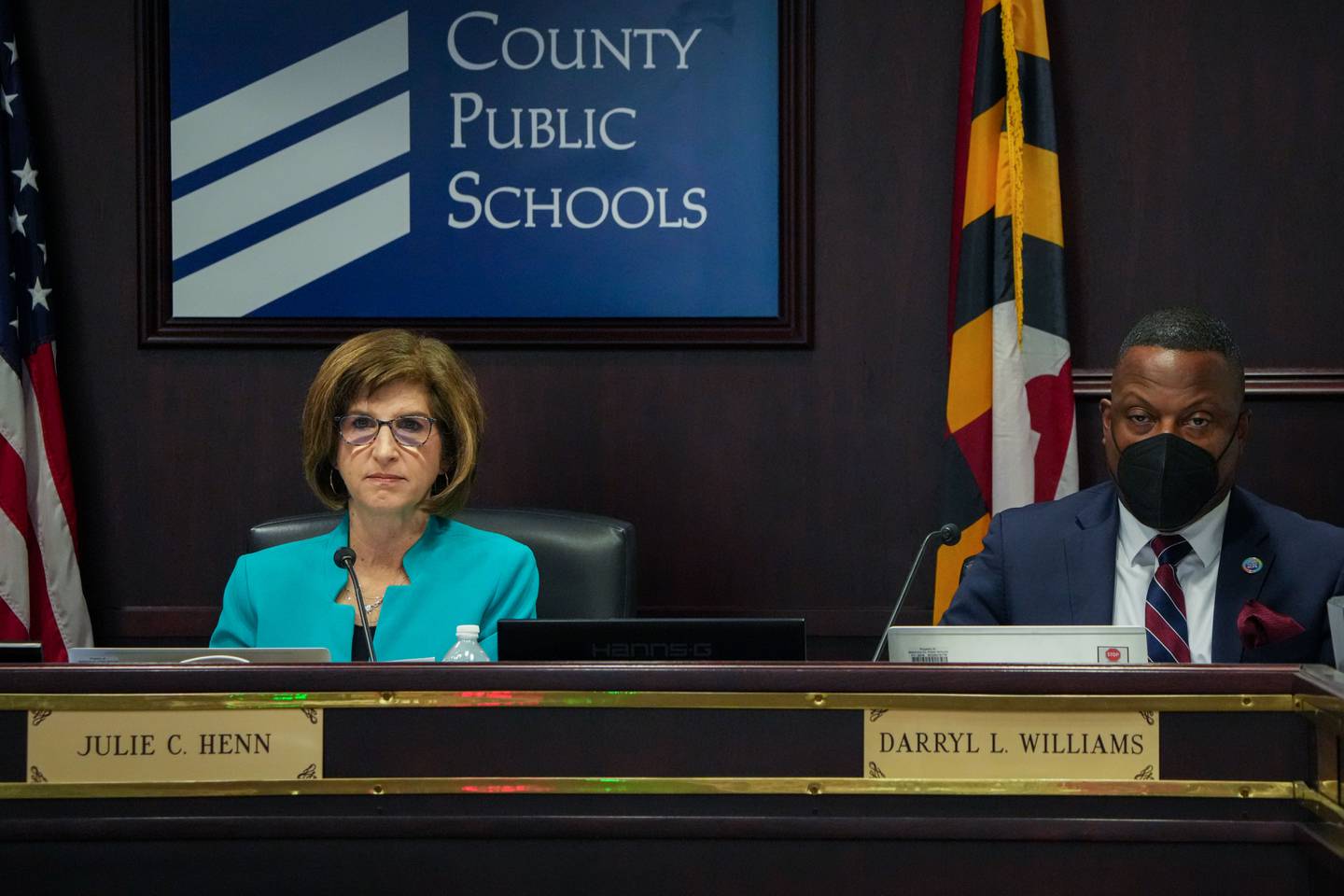 Board chair Jane Lichter, left, and Superintendent Darryl L. Williams listen to public comment at the Baltimore County Public School Board meeting on 12/6/22.