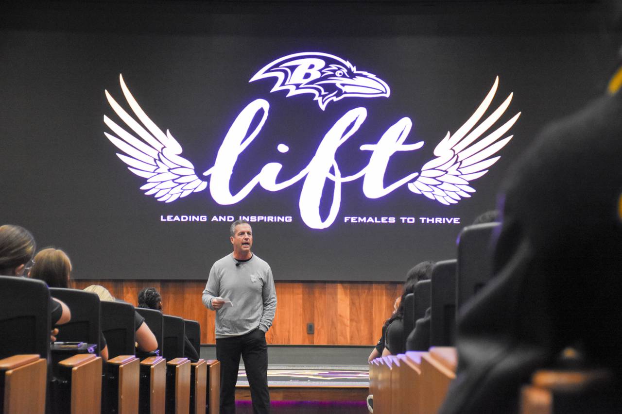 Ravens coach John Harbaugh answers questions from local high school female athletes at the Ravens LIFT Conference in Owings Mills on Thursday, April 4, 2024.