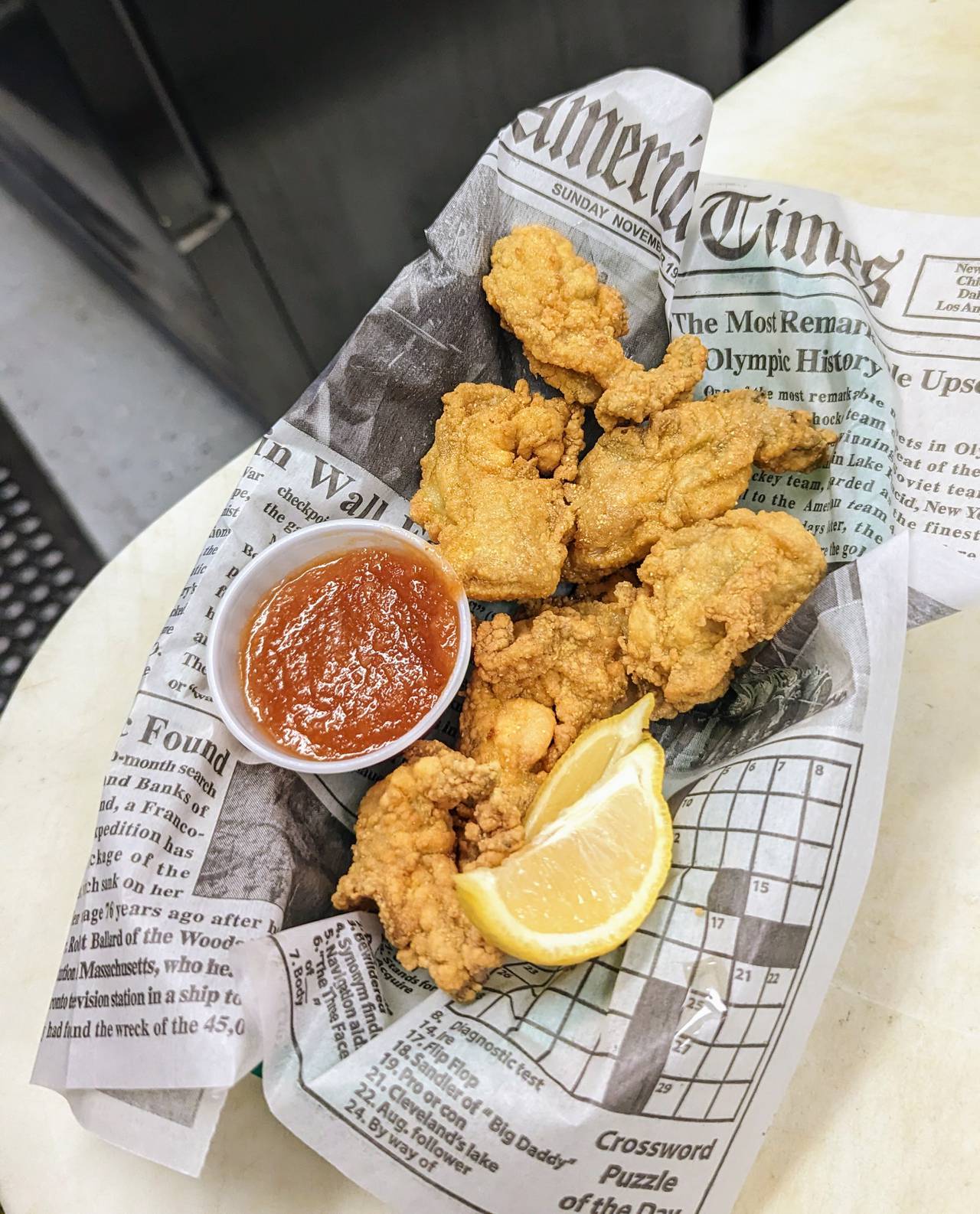 For a fritter, David White will shuck eight Patty’s Fatty’s, dropping them into a tray of seasoned meal where a quick roll turns the nectar into a thin batter. He’ll fry them, turn them into a paper-lined basket, and hand them over to you.