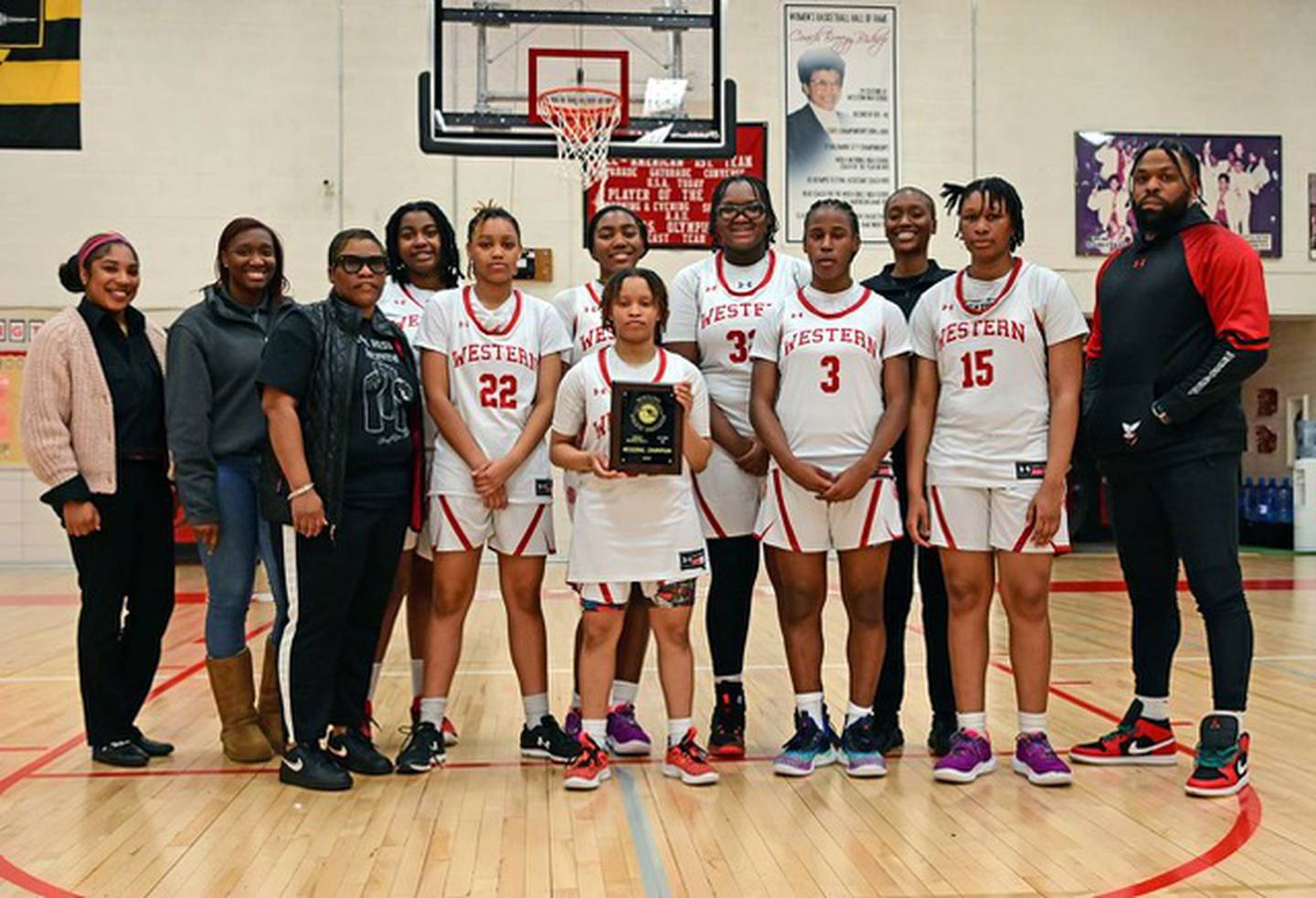 Western High's girls basketball team is again Class 4A North Region I champions. The defending state champs and 13th-ranked Doves defeated Dulaney.