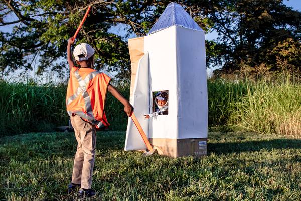 Vacant field or makeshift launchpad? Dad gets creative for kids’ spaceship adventure