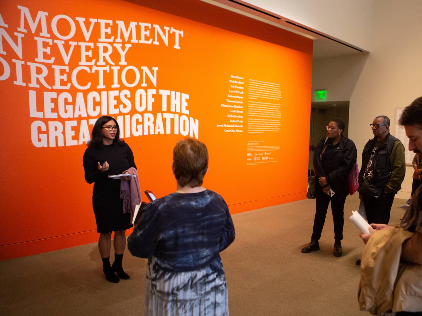 Jessica Bell Brown gives attendees a walkthrough of Baltimore Museum of Art's exhibition, "A Movement in Every Direction: Legacies of the Great Migration." The exhibition showcases artists whose work tells the personal stories and widespread impact of the Great Migration.