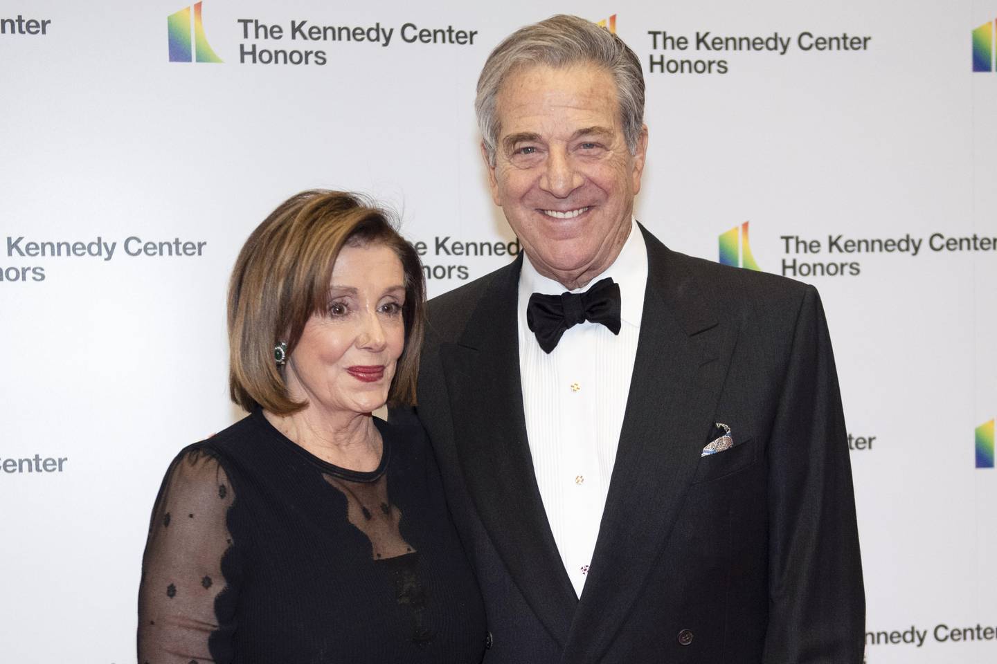 FILE - Speaker of the House Nancy Pelosi, D-Calif., and her husband, Paul Pelosi, arrive at the State Department for the Kennedy Center Honors State Department Dinner, Dec. 7, 2019, in Washington. House Speaker Nancy Pelosi’s husband, Paul, was “violently assaulted” by an assailant who broke into their San Francisco home early Friday, Oct. 28, 2022, and he is now in the hospital and expected to make a full recovery, said her spokesman, Drew Hammill.