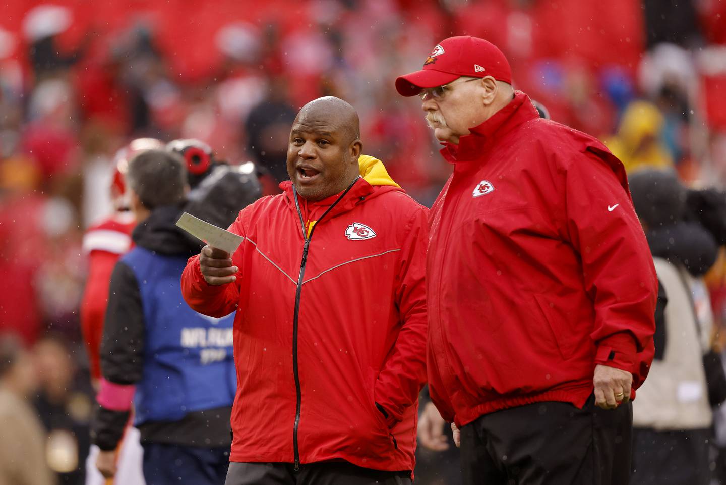 KANSAS CITY, MISSOURI - JANUARY 21: (L-R) Offensive Coordinator Eric Bieniemy talks with head coach Andy Reid of the Kansas City Chiefs prior to the AFC Divisional Playoff game against the Jacksonville Jaguars at Arrowhead Stadium on January 21, 2023 in Kansas City, Missouri.