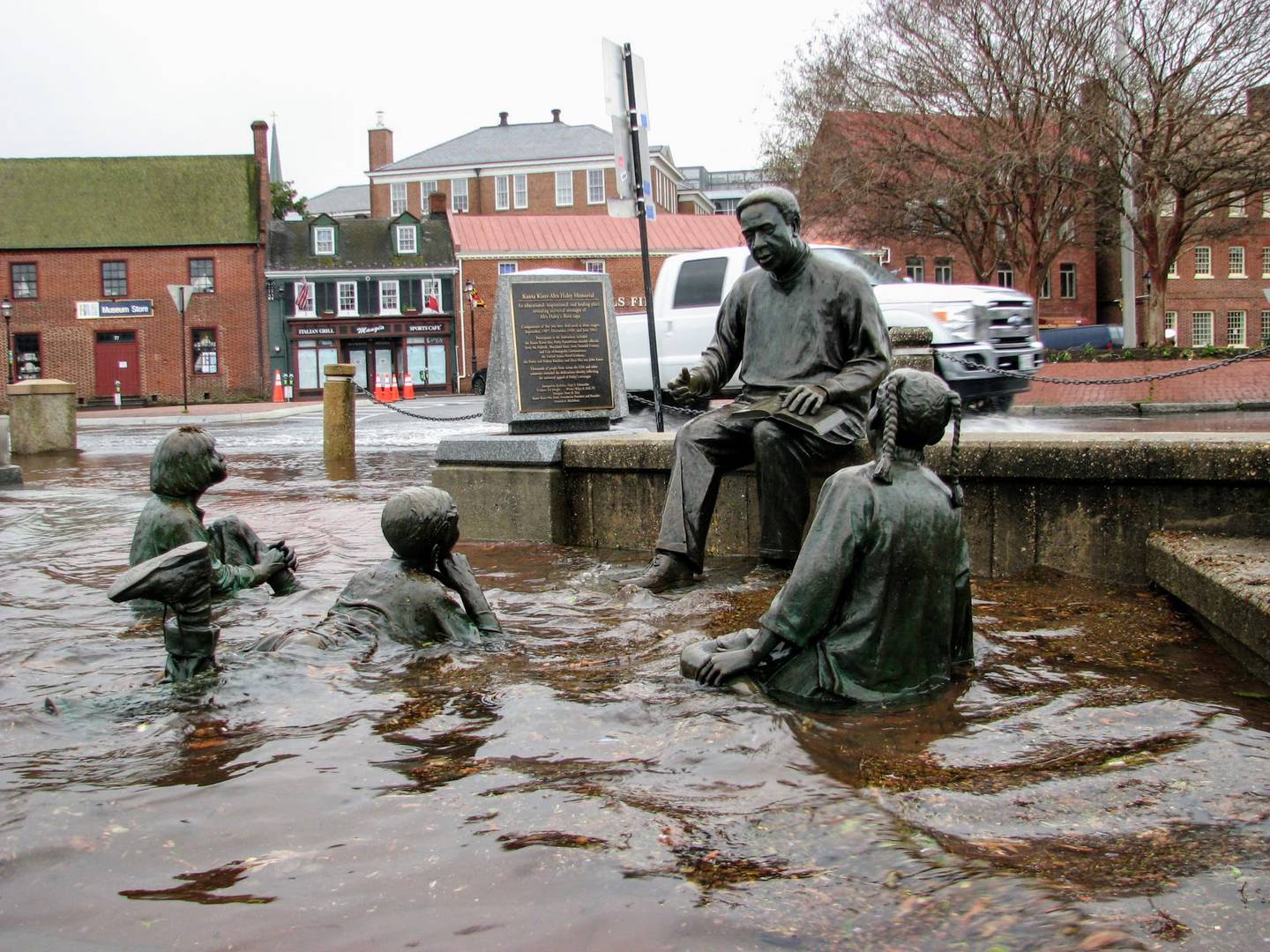 The water keeps rising at City Dock in Annapolis, often measured against the statue of author Alex Haley.