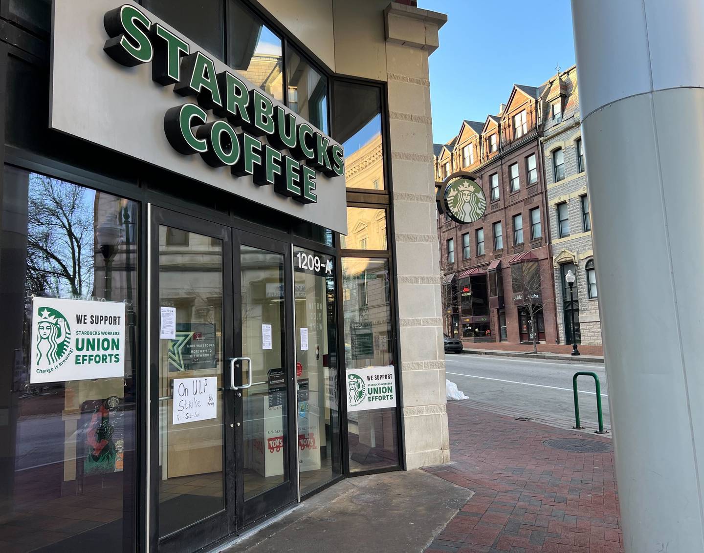 The Starbucks on North Charles Street in Baltimore is closed and covered with signs in support of Starbucks Workers Union, a labor union.