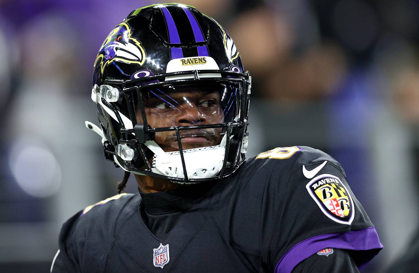 BALTIMORE, MARYLAND - NOVEMBER 28: Lamar Jackson #8 of the Baltimore Ravens warms up during a game against the Cleveland Browns at M&T Bank Stadium on November 28, 2021 in Baltimore, Maryland.