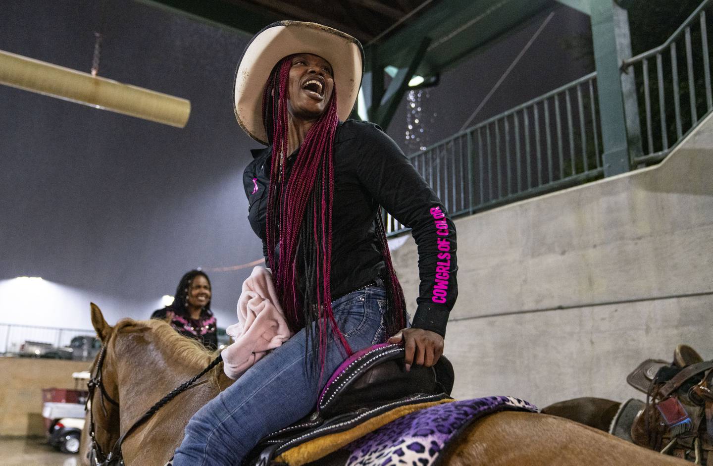 Sandra "Pinky" Dorsey, cheers on other competitors during the Bill Pickett Invitational Rodeo, at The Show Place Arena, in Upper Marlboro, MD, Saturday, September 23, 2023.