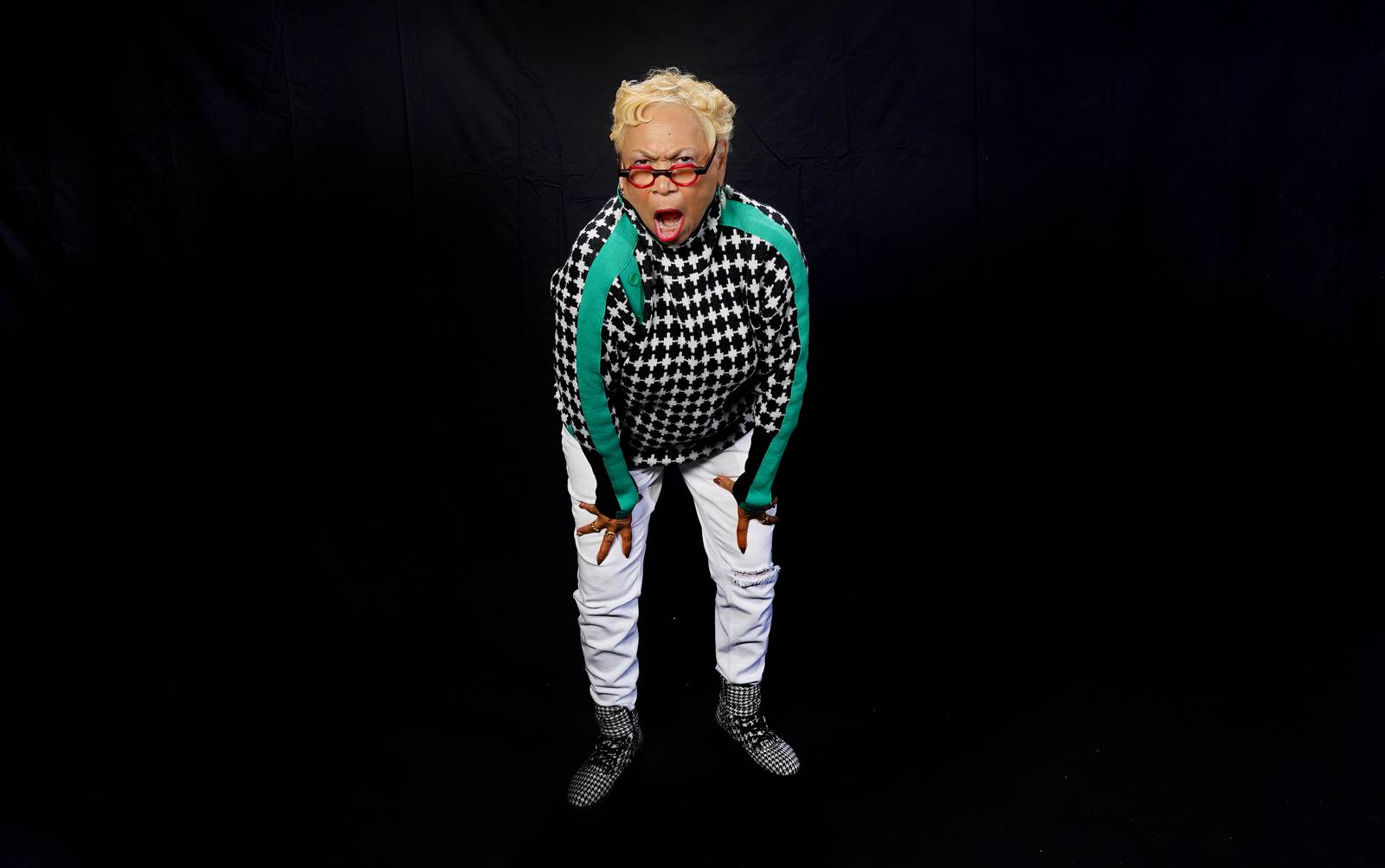 Carolyn Lloyd at the Banner Photo Booth for CIAA fans struts her stuff.