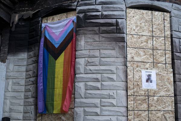 After neighbors fear hate crime, rainbow-colored flags flood the Abell neighborhood 