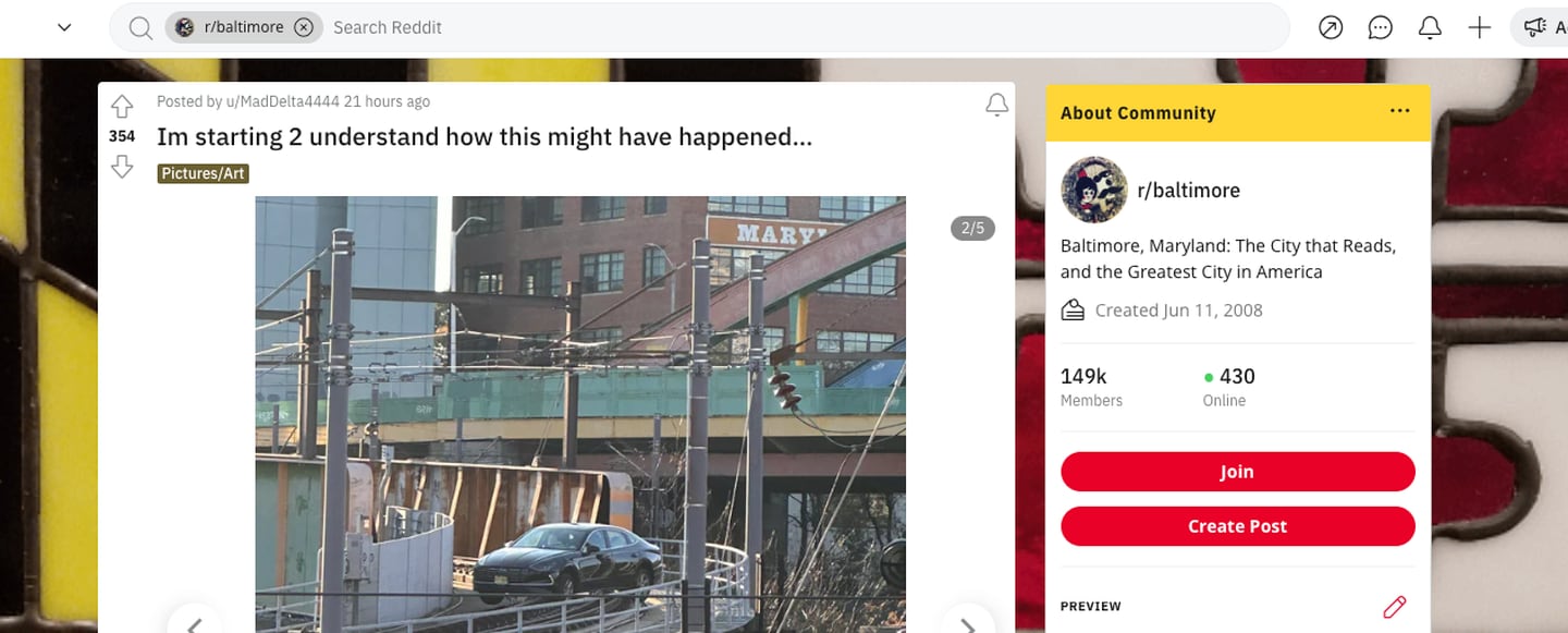 A screenshot of a social media post about a Hyundai abandoned on light rail station tracks.