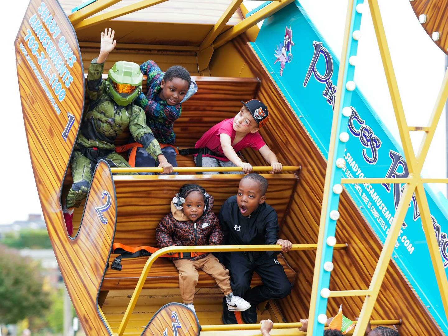 Children enjoy one of the many rides and attractions at the Harbor Harvest Festival. The event was located in the Inner Harbor, right next to the newly constructed Rash Field Park.