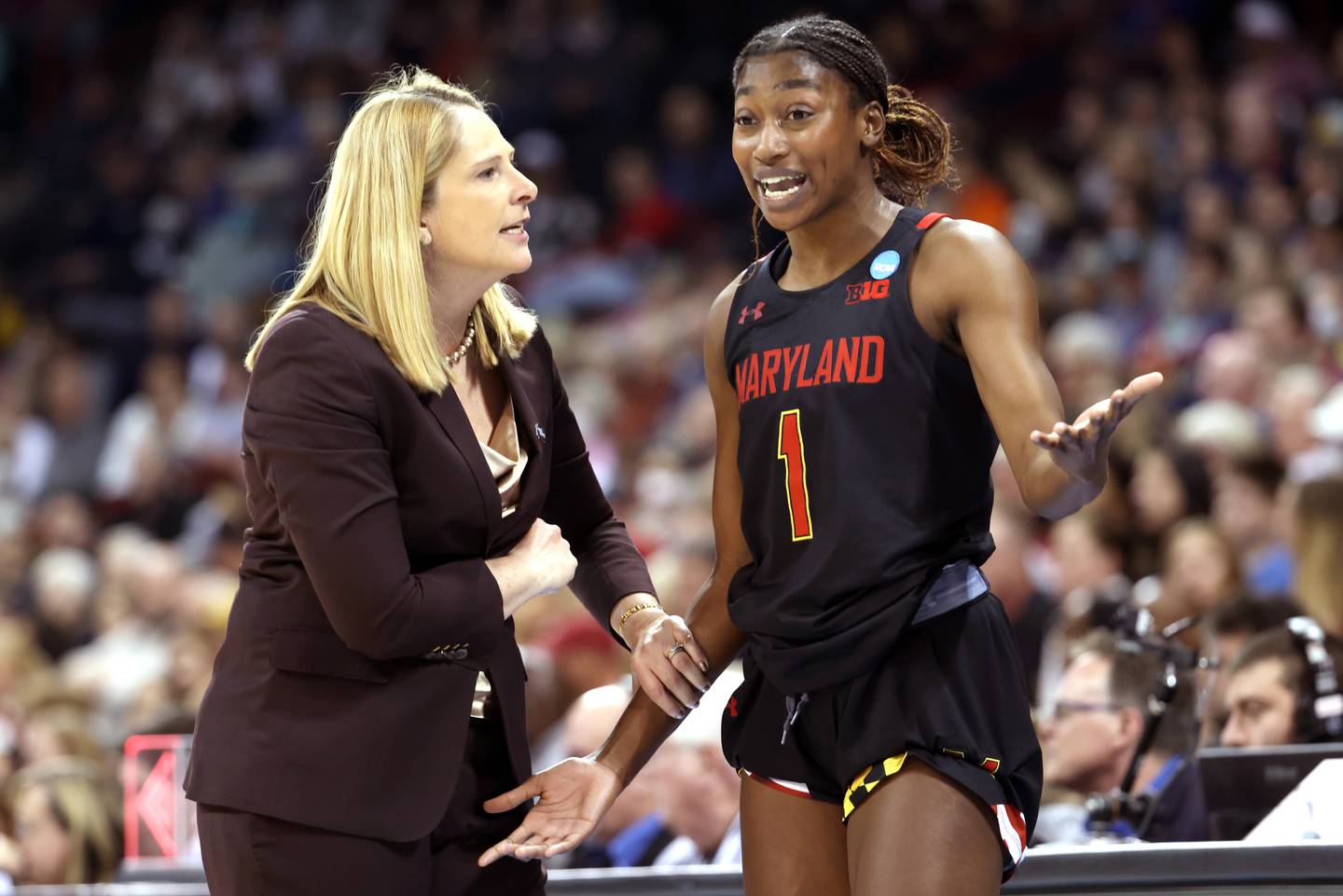 SPOKANE, WASHINGTON - MARCH 25: Head coach Brenda Frese of the Maryland Terrapins and Diamond Miller #1 react against the Stanford Cardinal during the second half during the Sweet Sixteen round of the NCAA Women's Basketball Tournament at Spokane Veterans Memorial Arena on March 25, 2022 in Spokane, Washington.