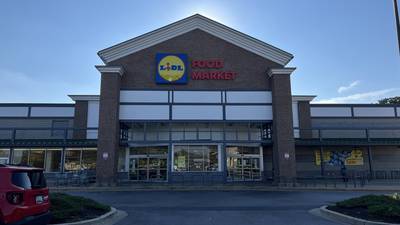 What is taking so long for the Lidl grocer in North Baltimore to open?