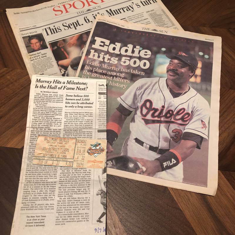 A collection of newspaper clippings and a ticket stub from Eddie Murray's 500th homer game.