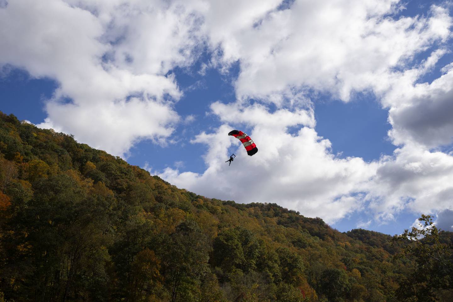 People from all over the world base jump off of the bridge during Bridge Day, an annual celebration of the famous New River Gorge Bridge in West Virginia. The bridge is currently the longest single-span steel arch bridge in the United States and the third highest bridge in the country.