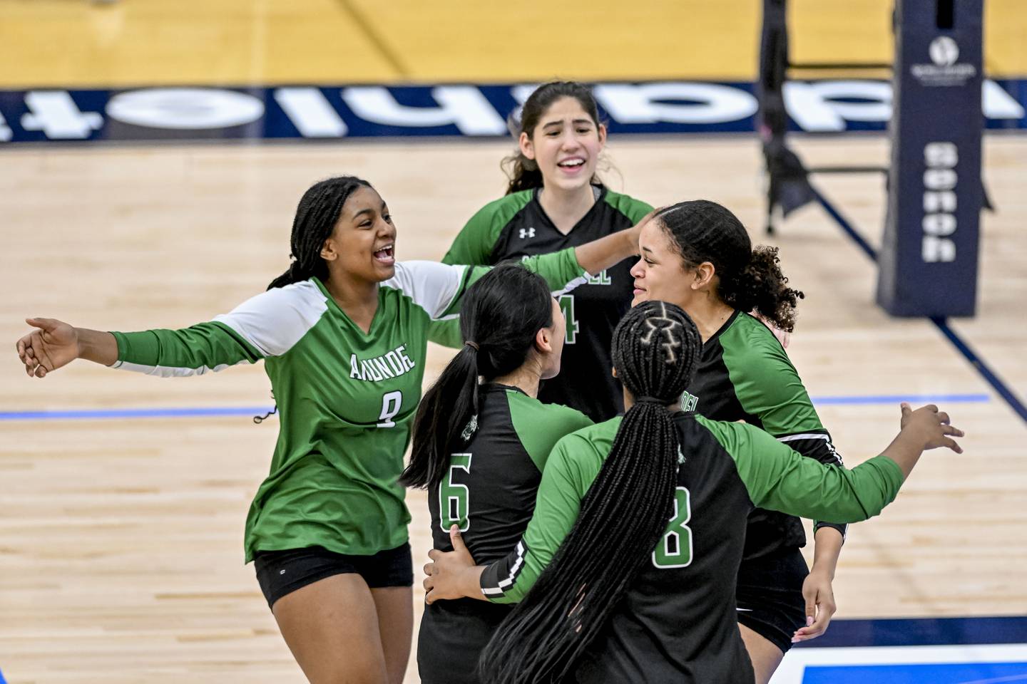November 17, 2022: Arundel celebrates a point during the MPSSAA 4A Volleyball State Championship matchup between Arundel High School and Urbana High School at the APG Federal Credit Union Arena in Bel Air, Maryland. photo by Scott Serio for the Baltimore Banner