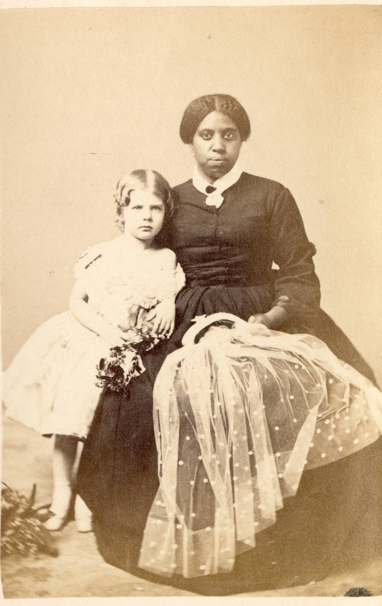 A carte-de-visite, or calling card photograph, of Nancy Davis and Eliza Ridgeley III. Nancy Davis was enslaved at Hampton, where she cared for the Ridgeley children.
