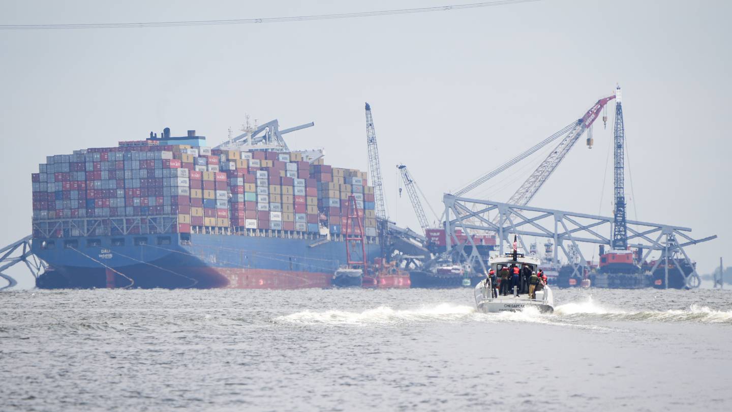 A U.S. Army Corps of Engineers boat approaches the Dali cargo ship, which toppled the Francis Scott Key Bridge in March, on April 25, 2024.