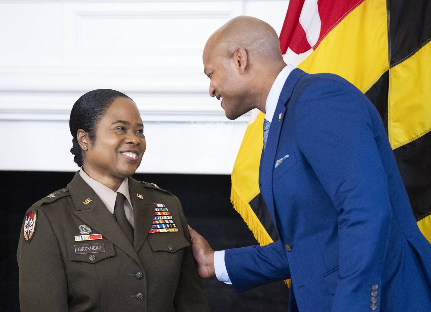 Brig. Gen. Janeen Birckhead and Gov. Wes Moore share a moment during a press conference announcing her nomination for state adjutant general, at the State House in Annapolis, Wednesday, April 5, 2023.