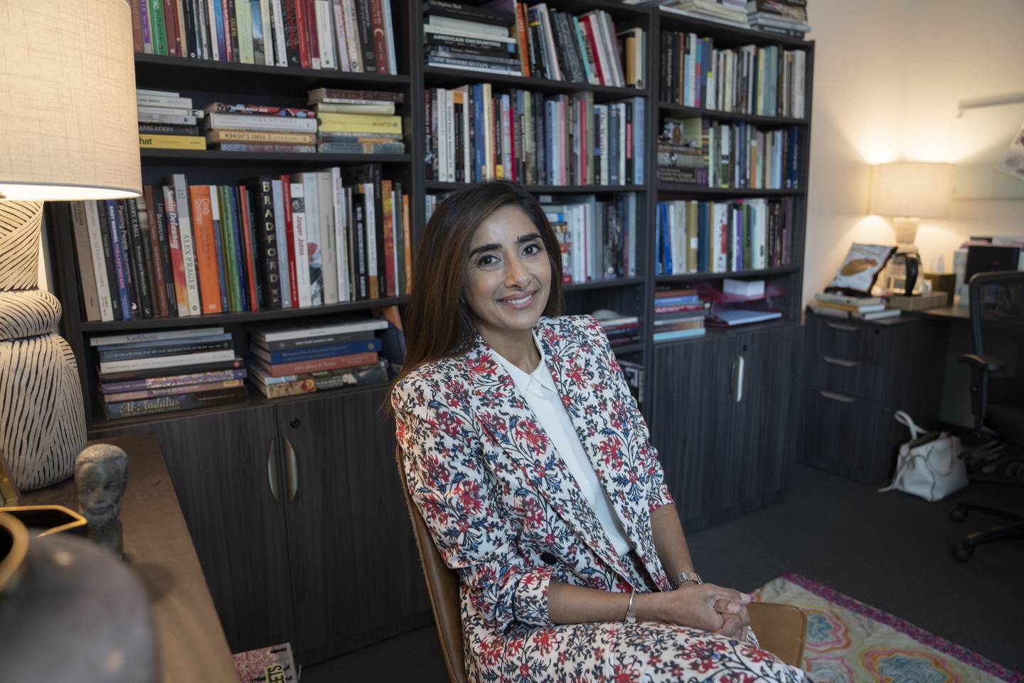 Asma Naeem, The Eddie C. and C. Sylvia Brown Chief Curator, sits in her office at the Baltimore Museum of Art.