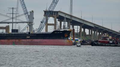 First cargo ship passes through newly opened channel after Key Bridge collapse
