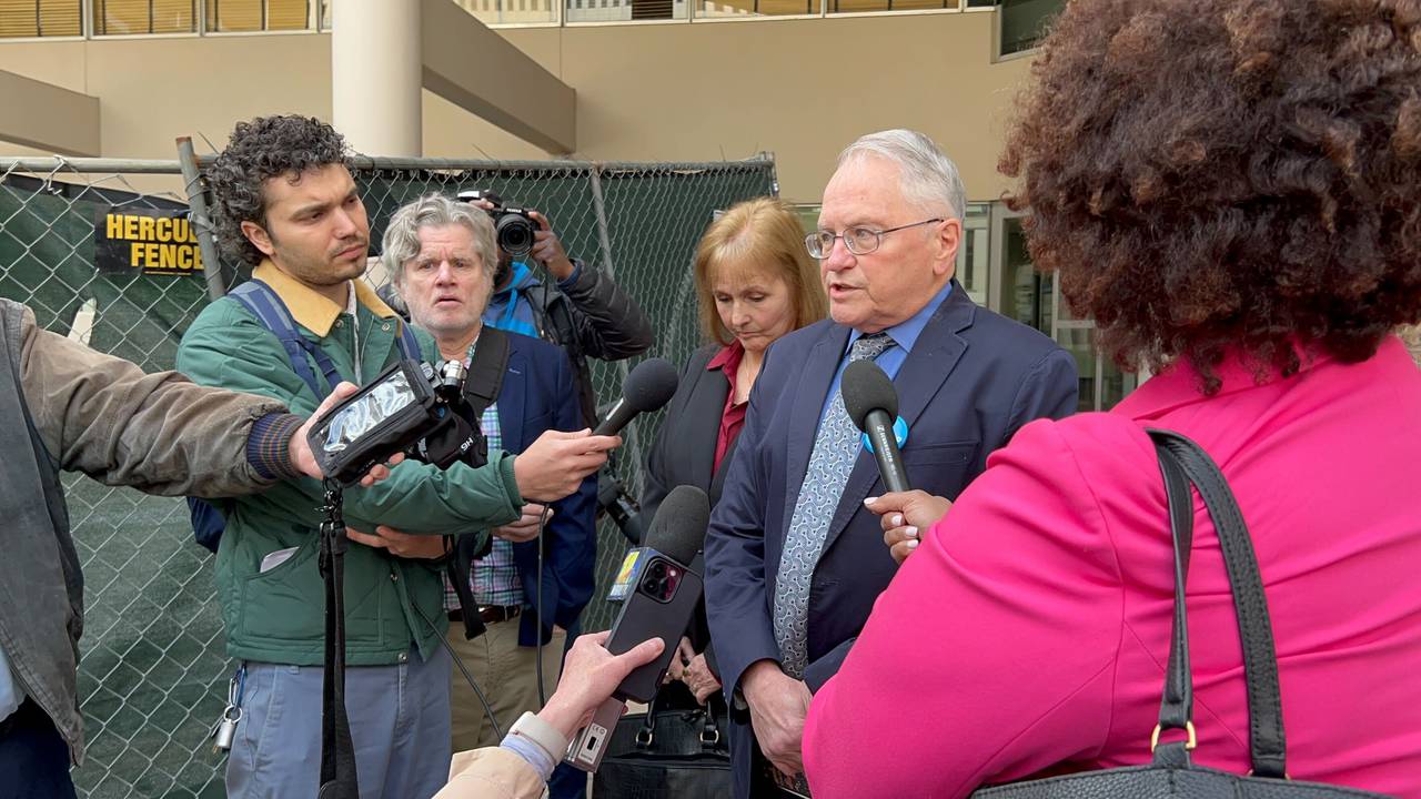 Frank Schindler, a spokesperson for the Maryland chapter of Survivors Network of those Abused by Priests, speaks at a news conference on Monday outside the Edward A. Garmatz U.S. Courthouse in Baltimore following a hearing in the Archdiocese of Baltimore bankruptcy case. Teresa Lancaster, one of the survivors who spoke in court, is standing to his left.
