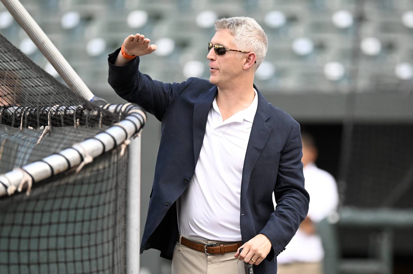 BALTIMORE, MARYLAND - SEPTEMBER 21: General Manager Mike Elias of the Baltimore Orioles watches batting practice before the game against the Detroit Tigers at Oriole Park at Camden Yards on September 21, 2022 in Baltimore, Maryland.