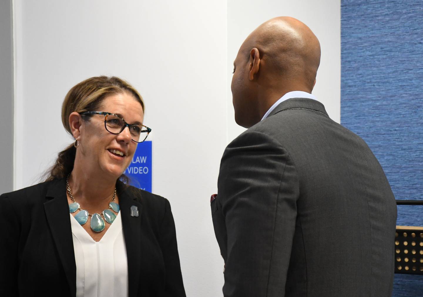 Karen J. Nelson, president and CEO of Planned Parenthood Maryland, speaks to Gov. Wes Moore at Planned Parenthood's Annapolis clinic on Friday, June 23, 2023, one year after the Roe v. Wade decision that legalized abortion was overturned.