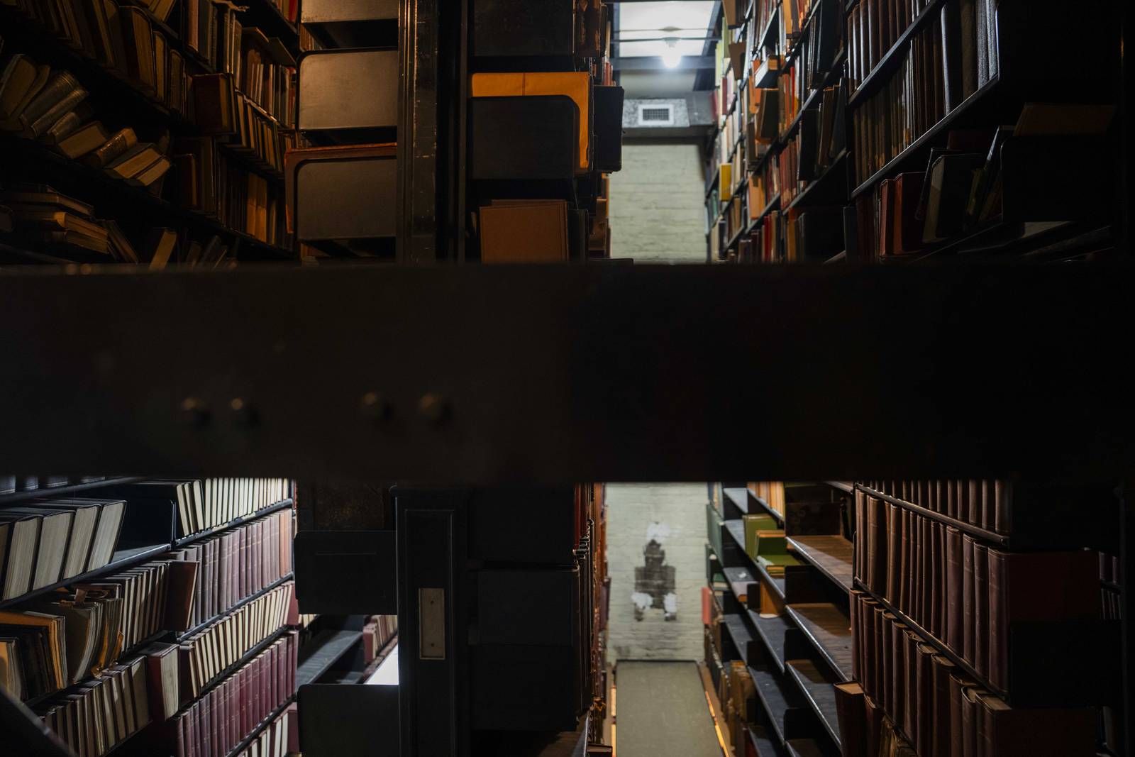 The library stacks at the Maryland State Medical Society are extensive, going up multiple levels and floors. The books date back to the 18th century. Here they are pictured  on August 2, 2023.