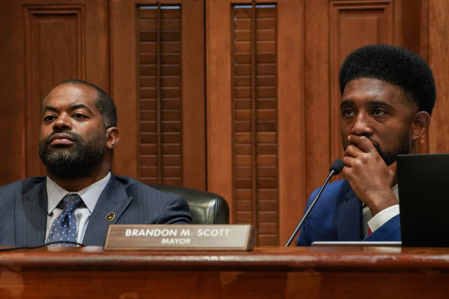 Council President Nick Mosby, left, and Mayor Brandon Scott listen during a Baltimore City Board of Estimates meeting inside City Hall on 10/5/22.