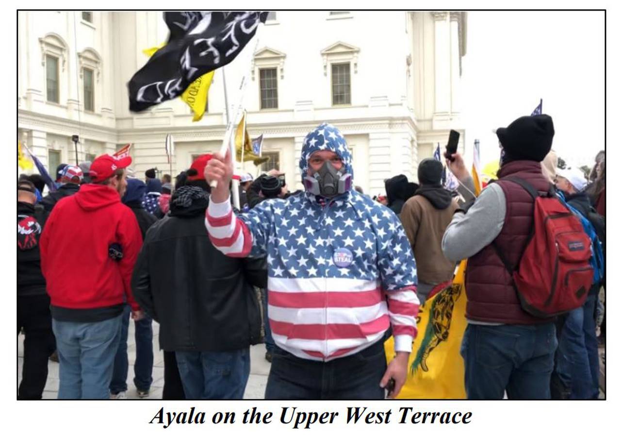 An image from federal court documents shows Carlos Ayala at the U.S. Capitol on Jan. 6, 2021. Ayala is charged with civil disorder and other charges.