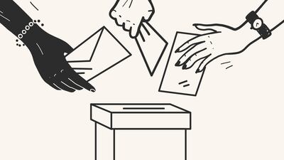 Hands placing ballots into a polling box