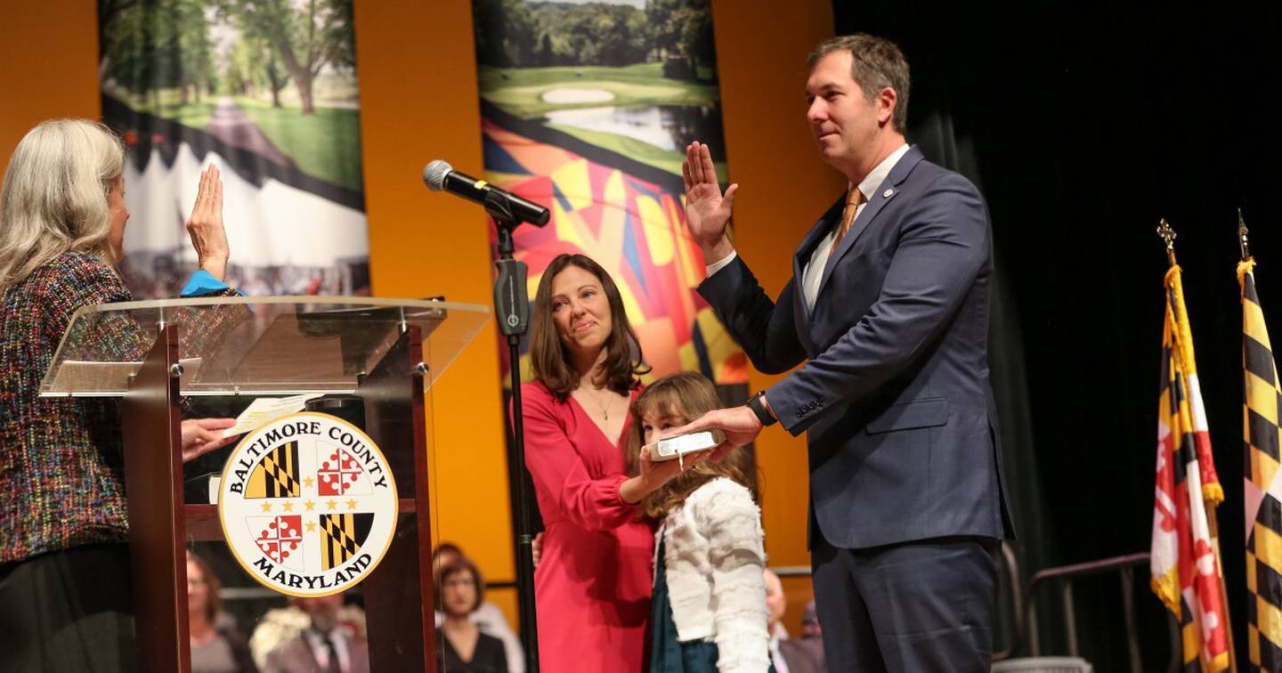 Johnny Olszewski is sworn-in with his family by his side for his second term as Baltimore County Executive on Dec. 5, 2022 in Towson.