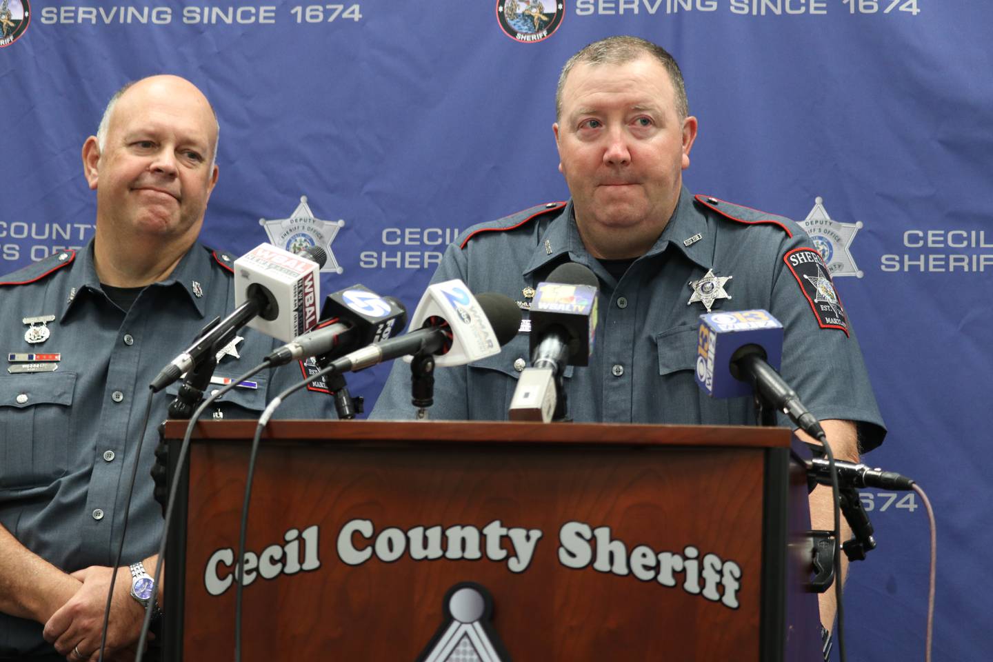 Cecil County Sheriff Scott Adams speaks at a news conference on Friday, Sept. 9, 2022 in Elkton, Md., about five people, including three children, who were found dead with gunshot wounds at a home in Elk Mills, Md., earlier in the day. Chief Deputy Gerald Widdoes is standing left.