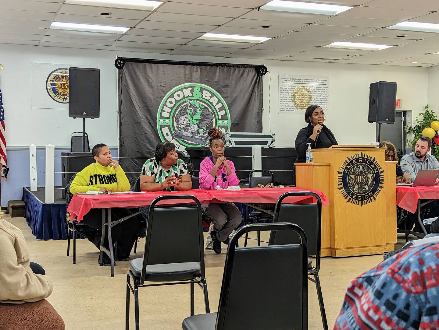 Del. Shaneka Henson, D-Annapolis, talks to residents of Woodside Garden during a community meeting called to discuss problems with the ongoing renovations and gun violence.