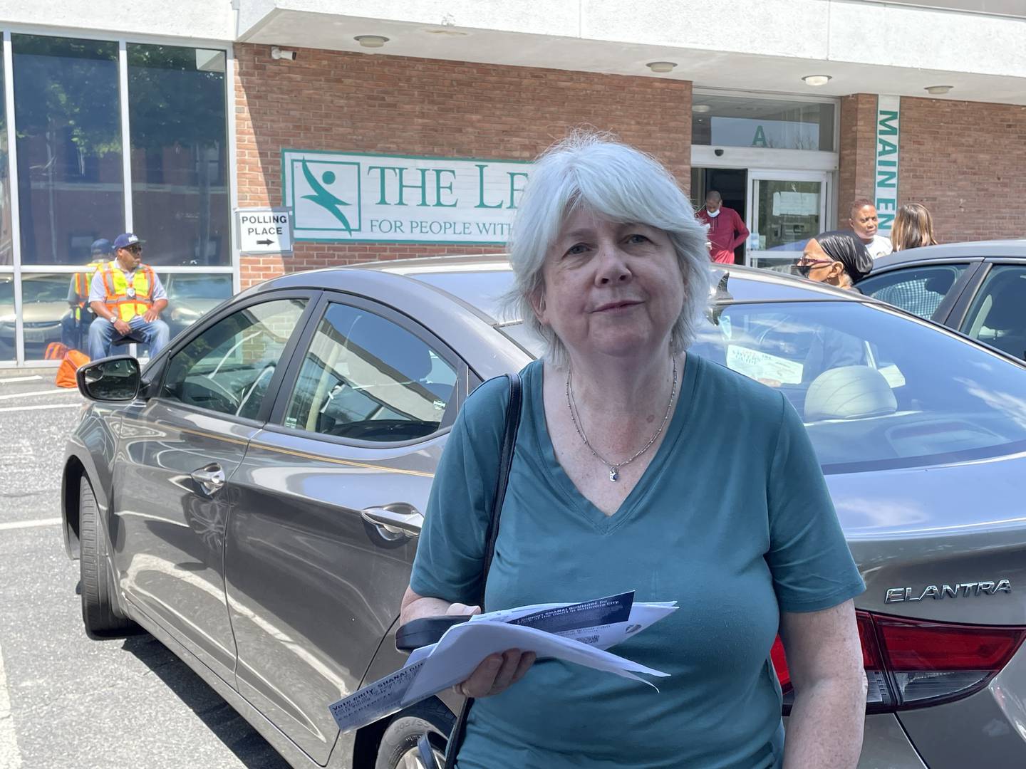 Roland Park voter Kathleen Lasker stands outside a Baltimore City early voting station at the League for People with Disabilities on East Cold Spring Lane Monday, July 11.