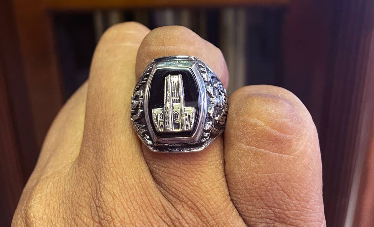 Leslie Gray Streeter tries on a City College ring to replace the one she lost.