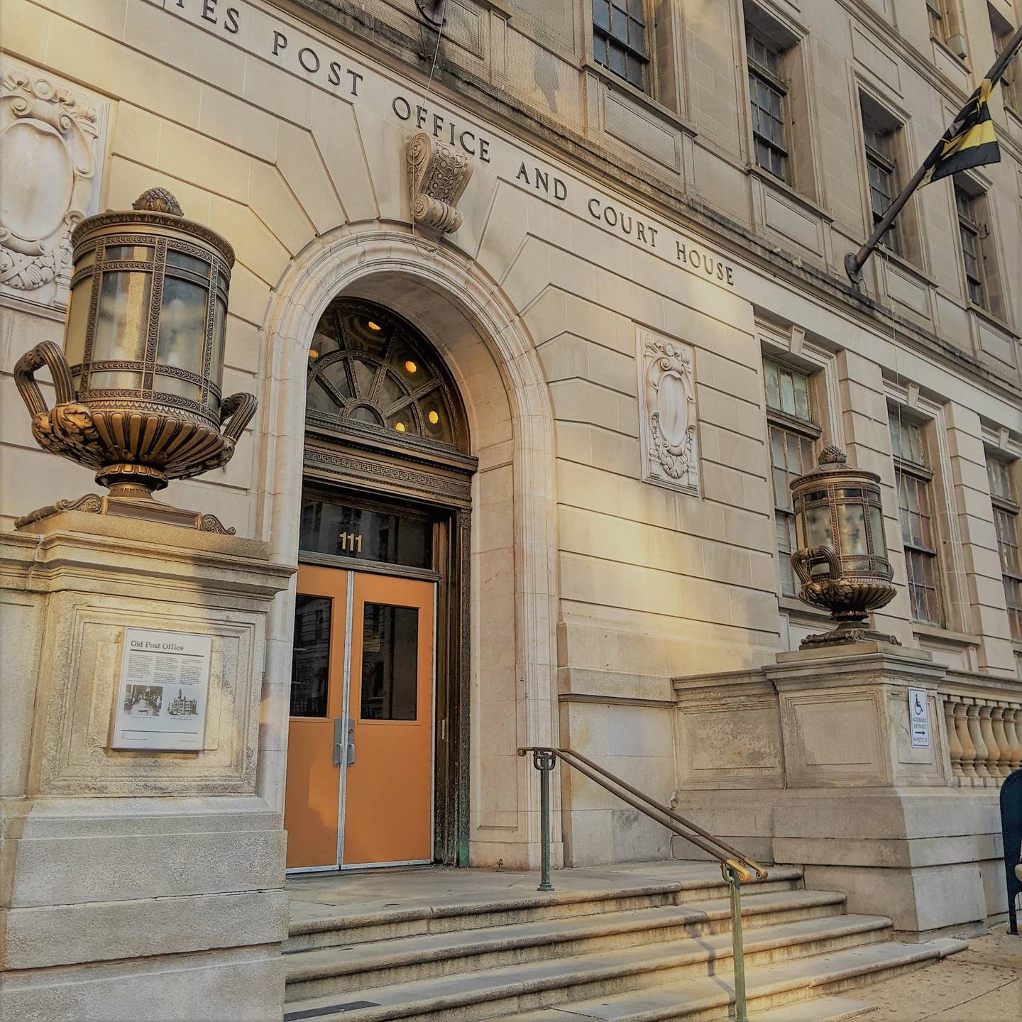 Come here often? The entrance for jury service at Courthouse East, 111 N Calvert Street.