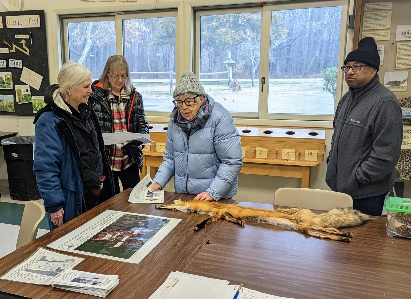 Agnes Lorentzen, center, visted the Greenbury Point Nature Center to demonstrate opposition to a golf course discussed for the site. The 100-year-old Virginia woman is the mother of the late founder of the center, Tina Lorentzen Carlson.