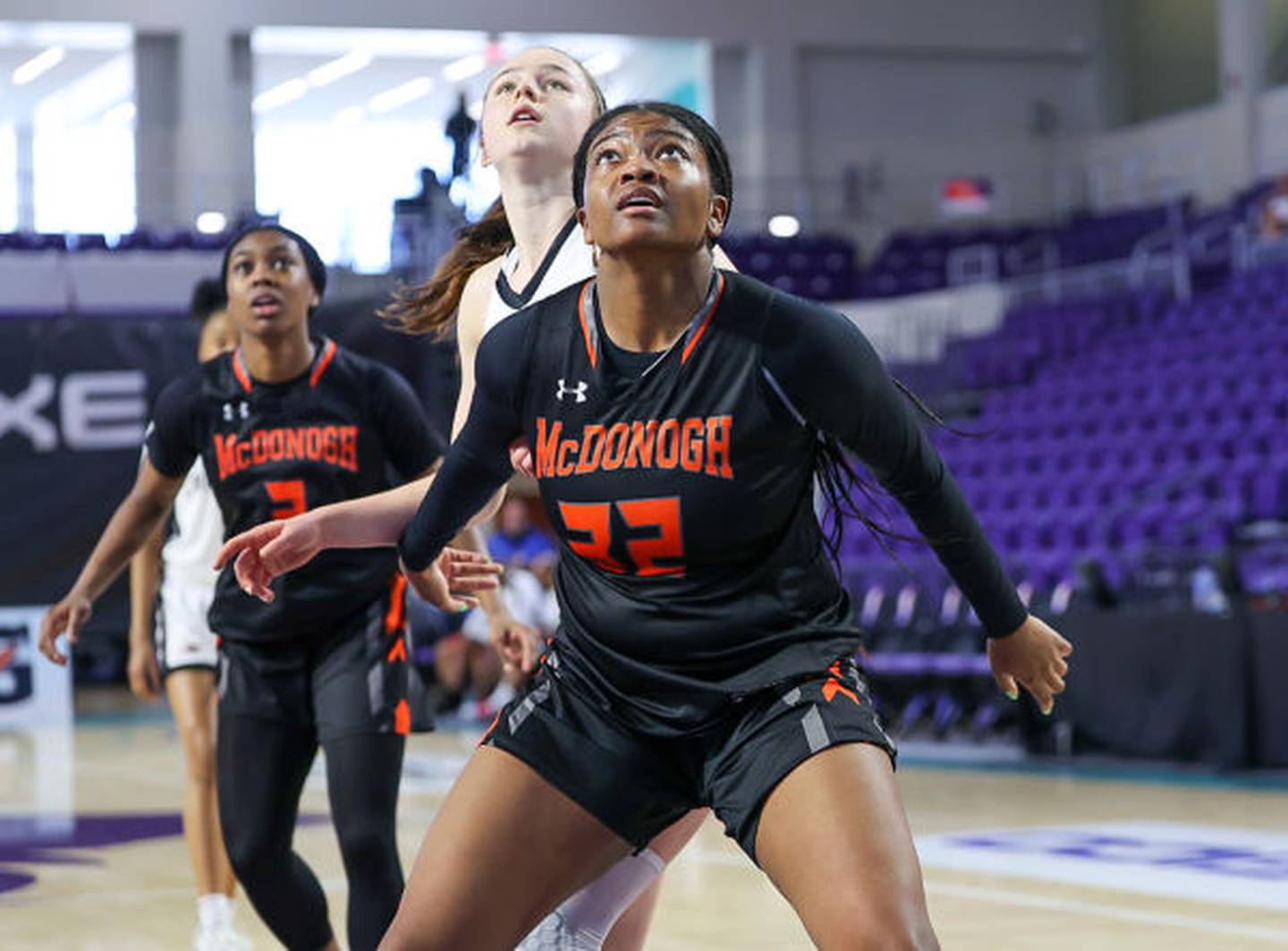 McDonogh's Paris Locke, who scored 16 points in Friday's GEICO Nationals semifinal game against Long Island Lutheran (NY), boxes out in the nationally televised contest.