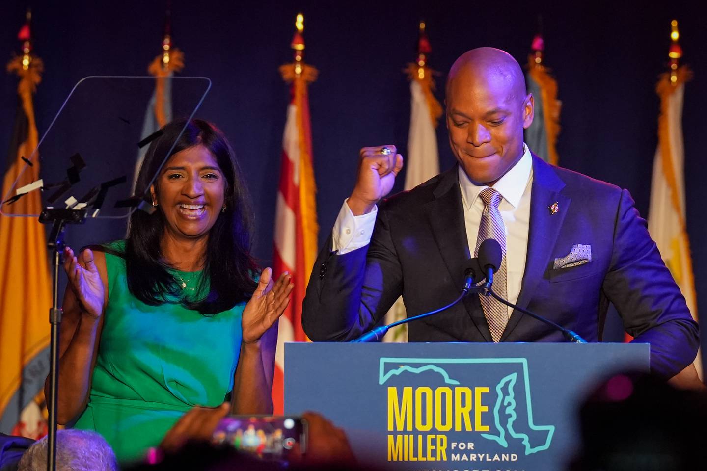 Democratic gubernatorial candidate Wes Moore celebrates with his running mate, Aruna Miller, after declaring victory at an Election Night event at the Baltimore Marriott Waterfront on Tuesday, November 8. Democratic candidates Wes Moore, Aruna Miller, Chris Van Hollen, Anthony Brown and Brooke Lierman held a combined event beginning at 8 p.m. as the polls closed.